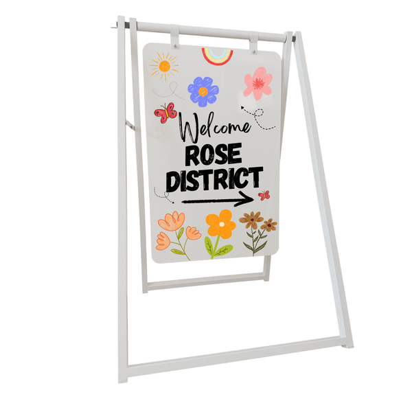 A-frame sign with 'Welcome Rose District' text and colorful flowers on a white background