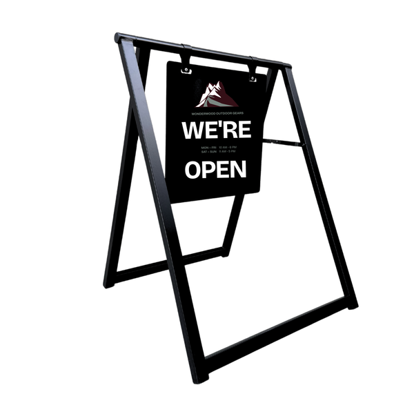Black a-frame sign with 'WE'RE OPEN' text on a white background