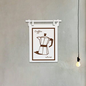 Poster with coffee pot illustration and text on a wall with a light bulb.