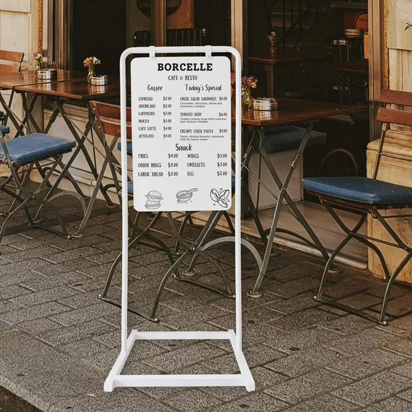 Outdoor cafe with a menu board displaying 'Borcelle' menu on swing sign