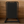Black metal swing stand with a black board in 32