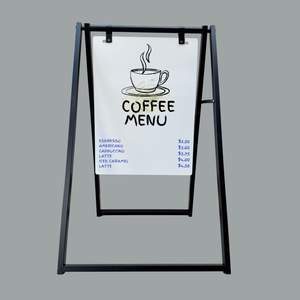 A-frame sign with a coffee menu on a gray background