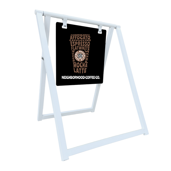 White a-frame sign holder with a black poster displaying coffee menu items on a white background