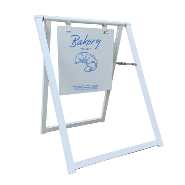 White street metal sign stand with a bakery-themed metal board on a white background