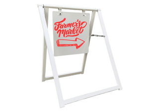 Famer's Market sidewalk business sign with an arrow pointing direction