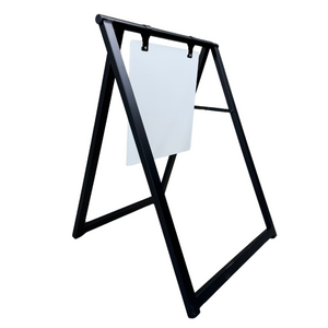 A black metal A-frame sign with a white acrylic board displaying text, set against a white background.