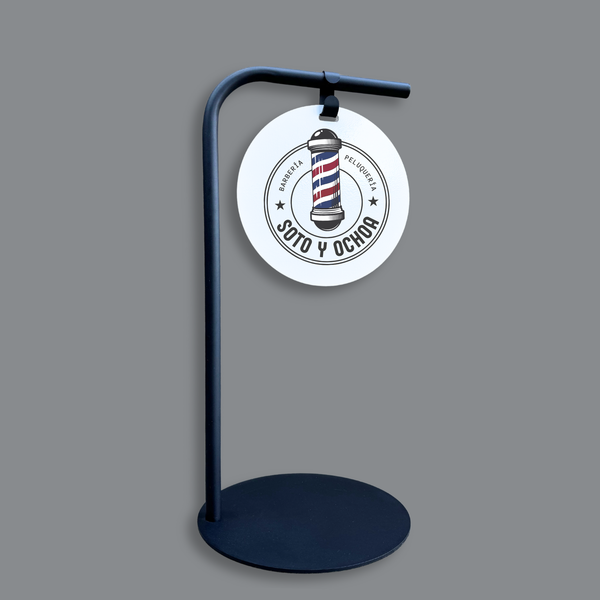 Black modern round stand featuring a custom barber pole design 