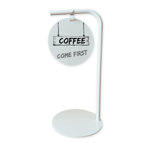 Decorative modern chalkboard sign with 'Coffee Come First' text on a white background
