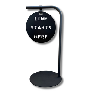 Round sidewalk business sign with black frame and black board