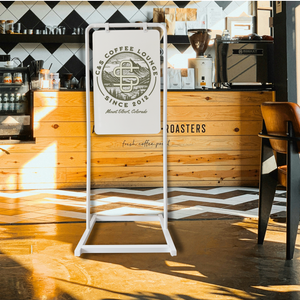 Minimalist Style Business Swing Sign display with custom logo in white frame with white board