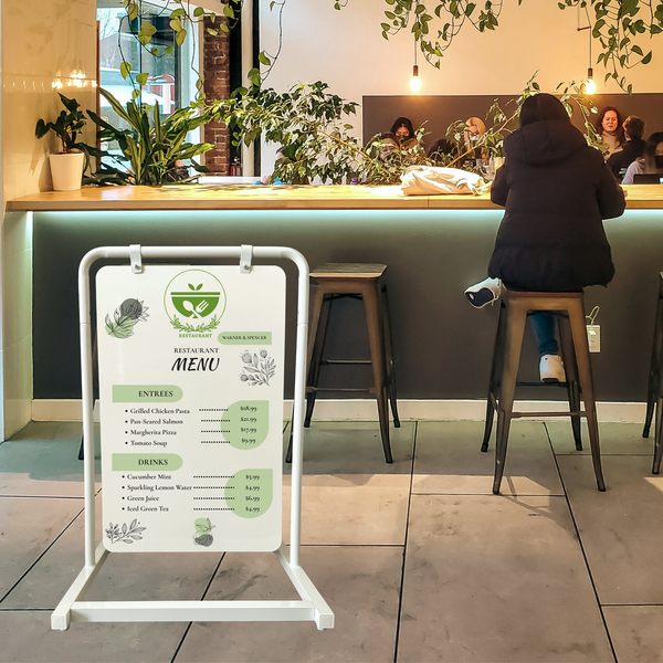 Metal Swing Sign in 32H configuration with restaurant menu display in white frame with white board