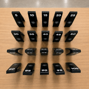 1-100 black table number signs stack in rows on a light wood tabletop. Each custom logo table number sign has number and custom logos
