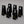 Six black A-frame table numbers 1 through 6 with white numerals and a gold Owl Cafe logo