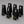 Set of black table number stands with numbers 1 to 6 and 'Owl Cafe' logo on a gray background