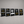 Five black metal large tabletop sign with yellow and white food-and-drink tableware graphics, shown on a gray surface against a gray background. The signs read Breakfast Served 6AM-10AM, Place Your Order Here, Wi-Fi Hotel, Scan to View Menu, and Thank You for Not Smoking.