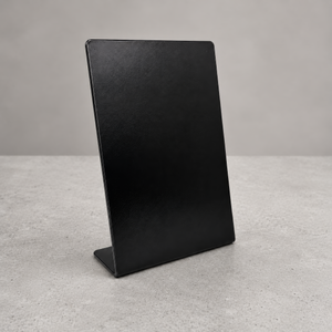 A black large counter vertical sign holder or display stand
