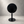 A modern black round table sign