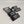 Black pastry menu signs with white text on a light gray background