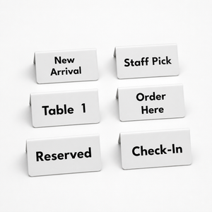 Set of white custom display sign with black text on a white background