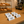 Bakery counter with pastries, an espresso machine, and menu display signs.