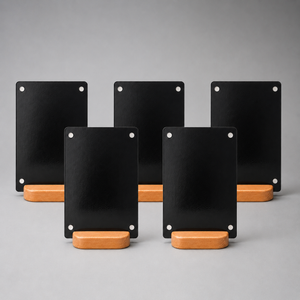 Five black table menu display boards with magnets with solid wood base