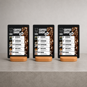 Three custom printed coffee shop menu display signs on wooden stands, displayed side-by-side on a gray countertop.